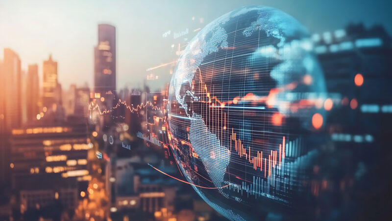 Digital globe with data streams and stock market graphs over a modern city skyline, symbolizing global finance and the AI bubble.