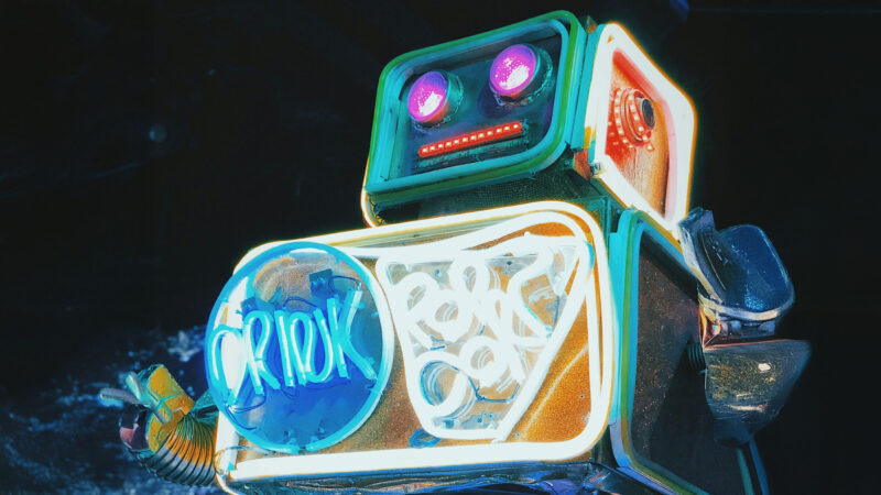 Colorful neon robot in a game-like environment representing the immersive and addictive digital world of Roblox.