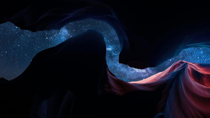 AI and Transrational Pedagogy: Dreamlike canyon landscape beneath a star-filled sky, symbolizing expanded ways of knowing beyond rational and linear thinking.